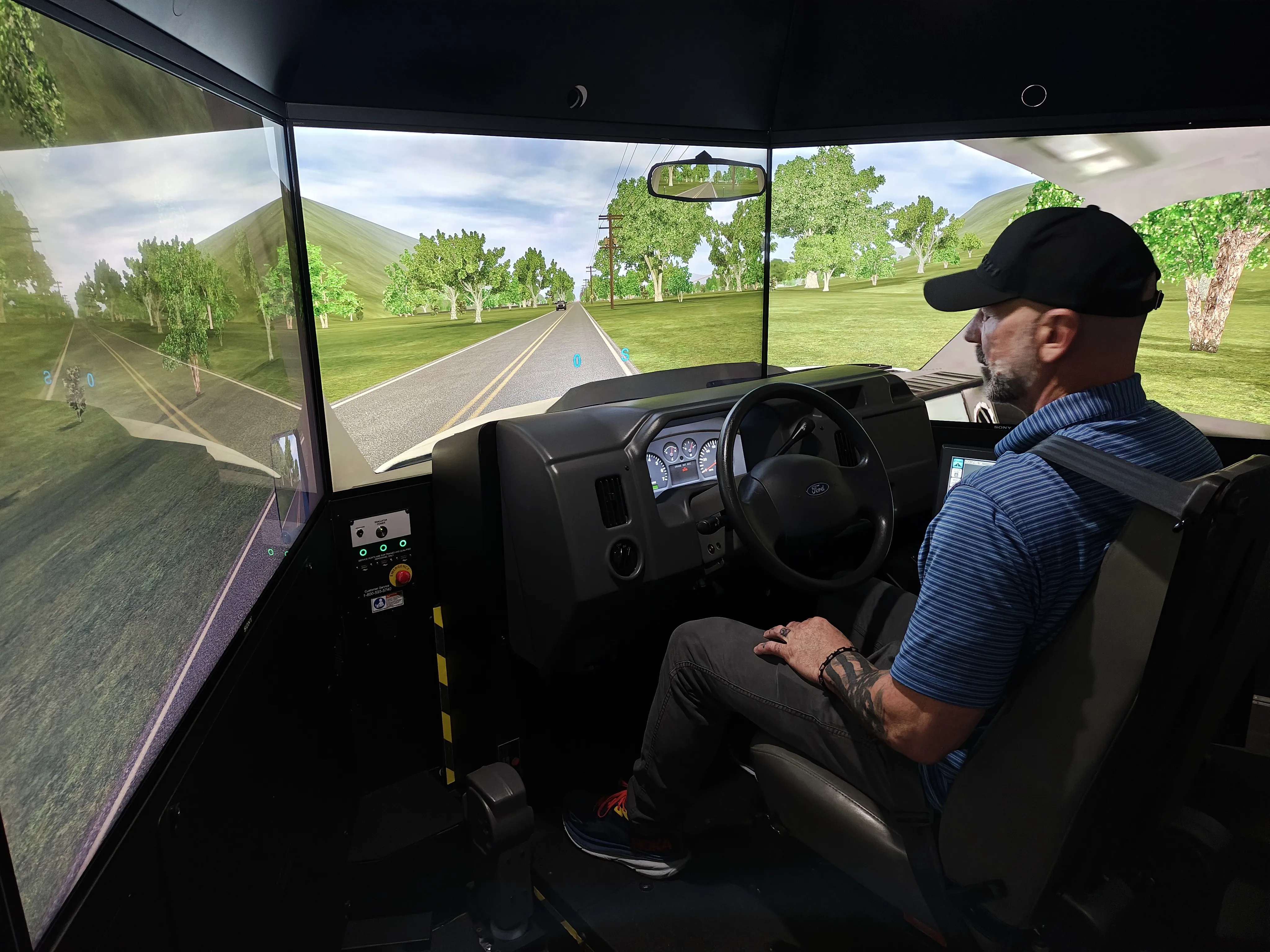 Driver practicing decision-making in a Training Wheelz USA simulator
