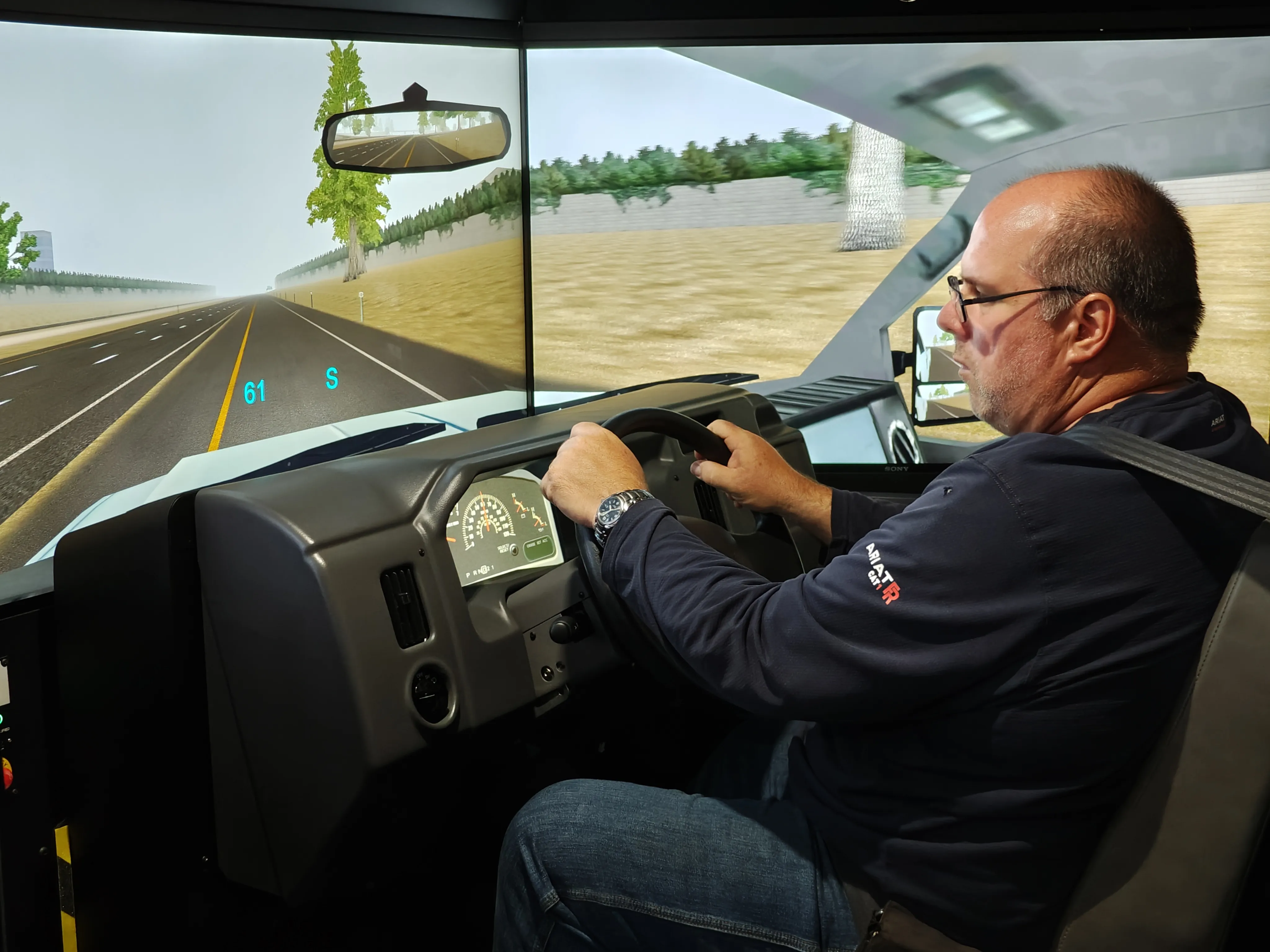 Driver completing simulator training at Training Wheelz USA